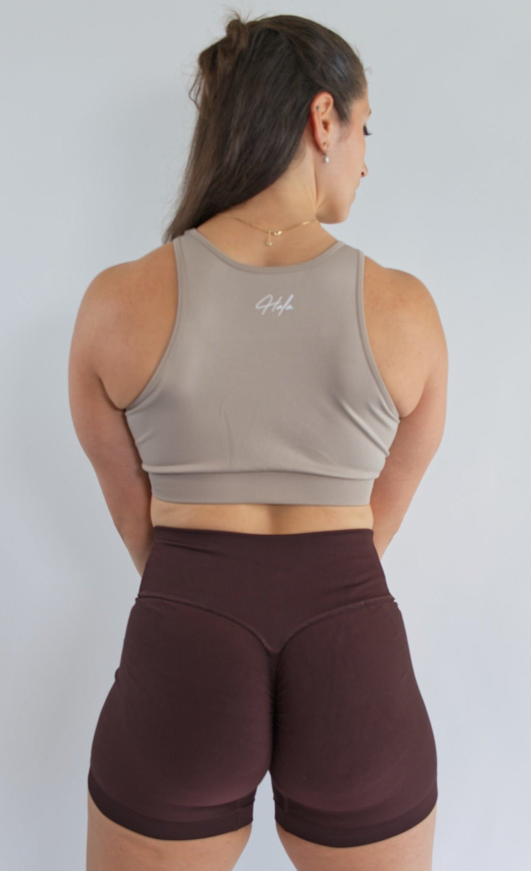 Cute High neck sports bra taupe back view